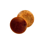 Two round, brown leather patches on a white background