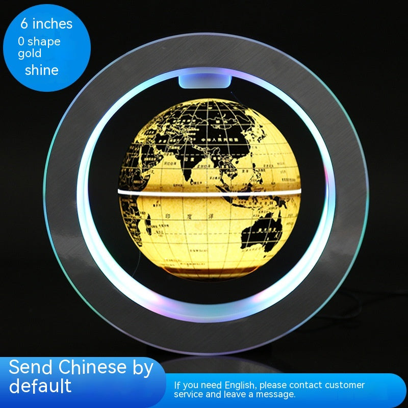 World map globe with gold finish and circular light on a black background