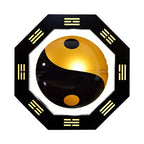 Yin and yang symbol inside an octagonal frame with wavy lines on a white background