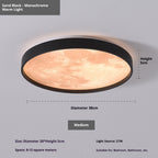 Ceiling light fixture with sand black finish and warm light on a gray background