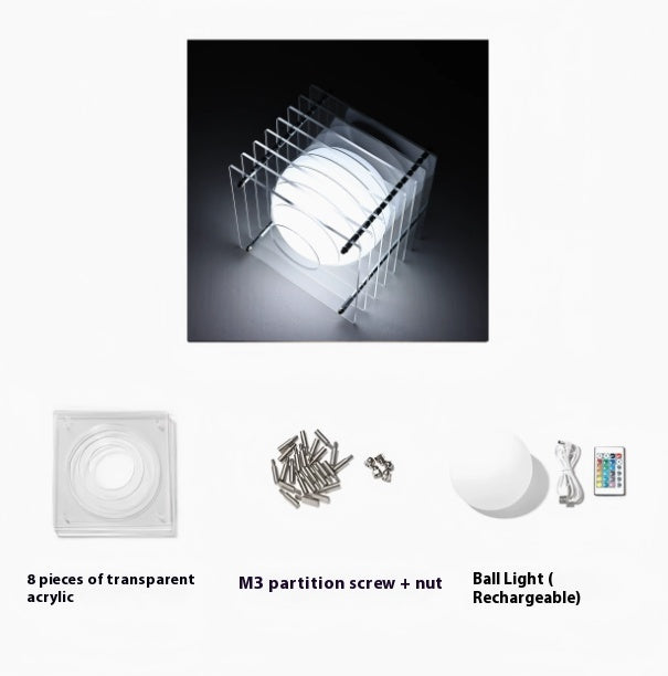 Components of a light fixture including acrylic pieces, screws, and a rechargeable ball light.