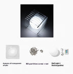 Components of a light fixture including acrylic pieces, screws, and a rechargeable ball light.