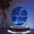 Levitating star map globe with constellation design on a dark background