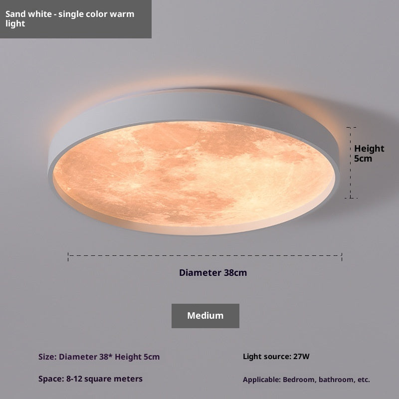 Ceiling light fixture with sand white finish and warm light on a gray background