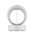 White electronic device with circular top and rectangular base on a white background