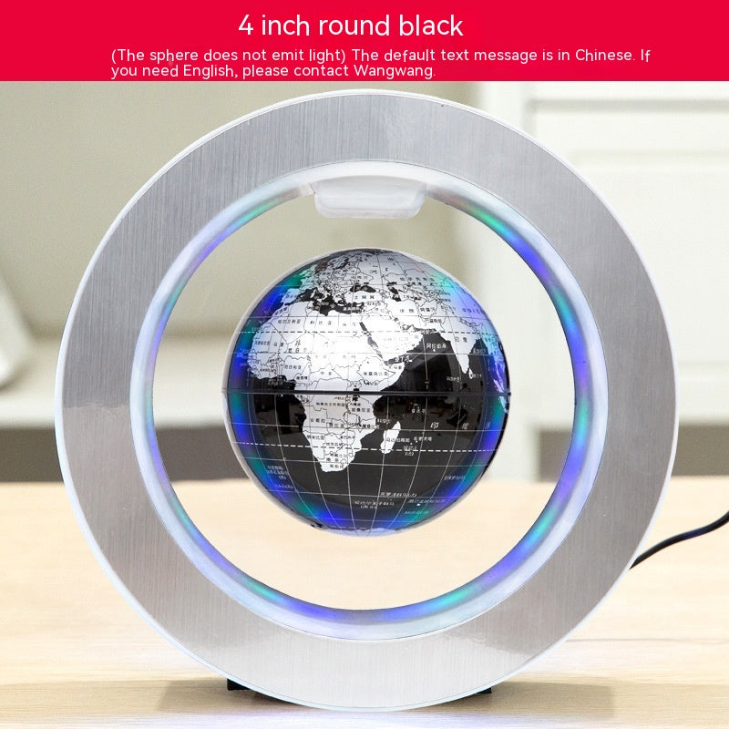 4-inch round black globe with LED lighting on a white surface